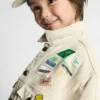 Chaqueta infantil Snopdog - 20 años Referencia: KSNOP16A20H26